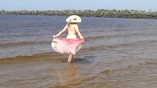 Naked hot MILF on a nude beach